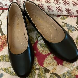 Worn once!  Small heel black pump.  Read description and see all pics.